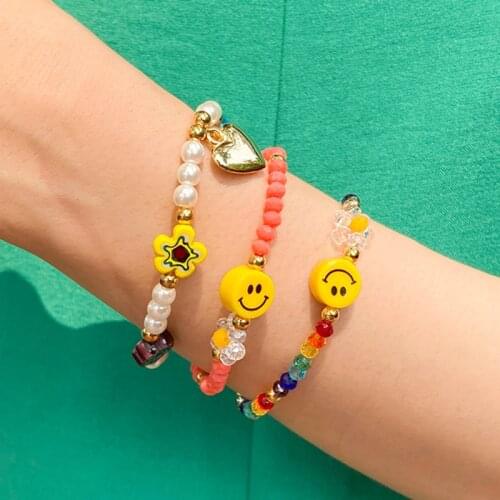 HUANZHI 2021 New Korean Cute Smiley Face Sunflower Daisy Colorful Transparent Crystal Elastic Beaded Bracelet for Women Girls