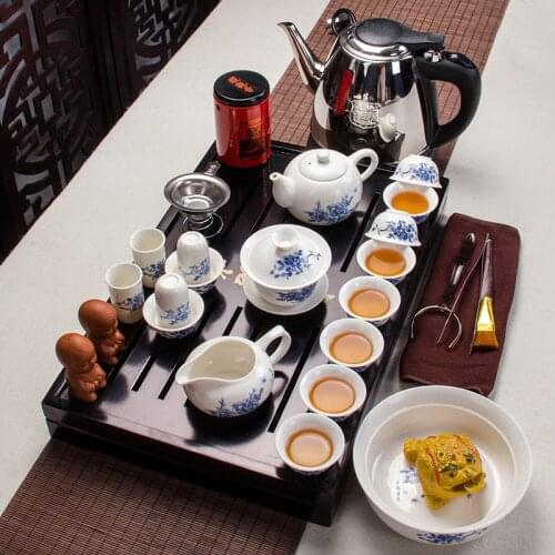 Yixing Kung Fu tea set solid wood tea tray teapot high quality ceramic tea sets cup with a electric kettle