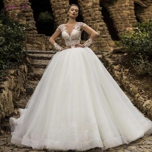 Julia Kui Beauty Beaded Pearls O-Neck Ball Gown Wedding Dresses Full Sleeves Silky Tulle Princess Bride Gowns