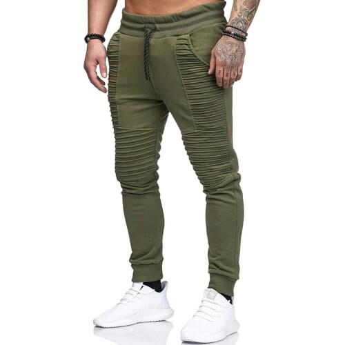 2020 New Personality Men Casual Solid Color Folds Elastic Waist Waist Rope Decoration Trousers Mail Pants