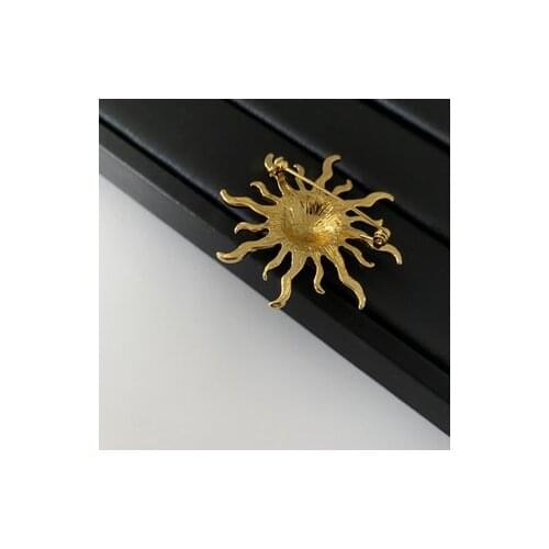 European and American vintage middle-aged sun brooch