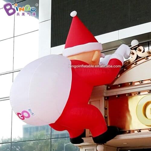 Customized Inflatable Santa Claus Wall Climbing Father Christmas Balloon Doll for Christmas Decoration