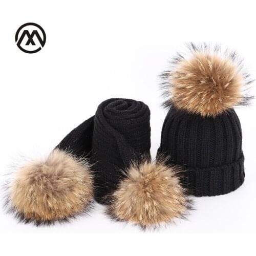 New autumn and winter childrens knitted raccoon fur pom-pom hats color warm and comfortable ski adjustable boy girls caps bone