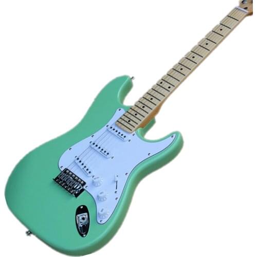 The factory customizes electric guitars of various colors
