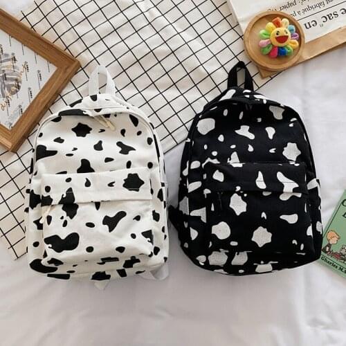 The New Cow Pattern Canvas Backpack Cute Easy Spot Hit Color Student Schoolbag Cross-border Trend Couple
