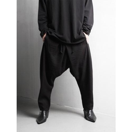Mens hanging crotch pants new casual pleated wrapped pants mens elastic waist large size to resist pants