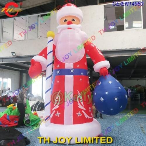 Free door shipping giant inflatable santa claus with gift bag and candy cane, outdoor advertising inflatable santa claus cartoon