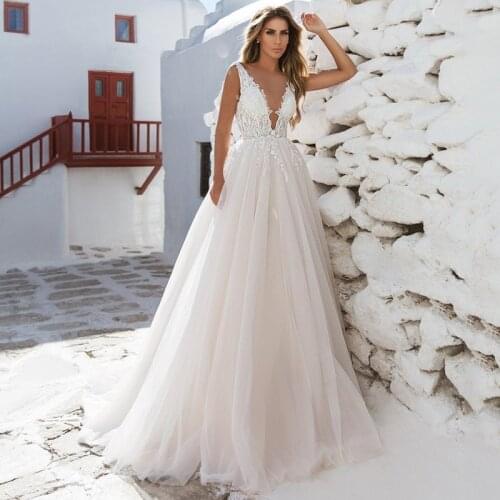 Sexy Beach Wedding Dresses 2021 V Neck Backless Bride Dress A Line Women Vintage Wedding Gowns Custom Made Abito Da Sposa