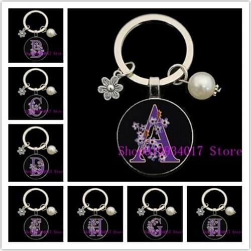 New style purple flower letter round glass keychain simple black A-Z letter pattern glass keychain flower pearl pendant keychain