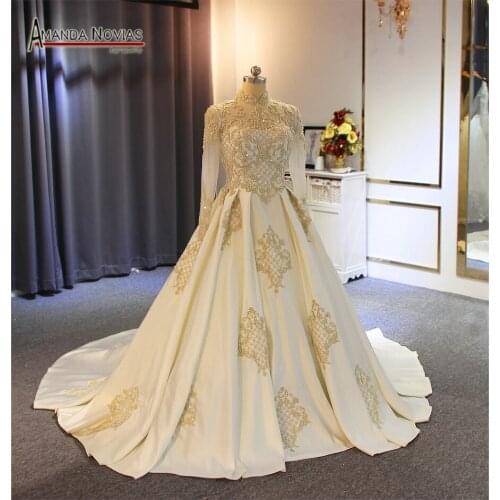 2019 Muslim satin wedding dress with high neckline with golden lace