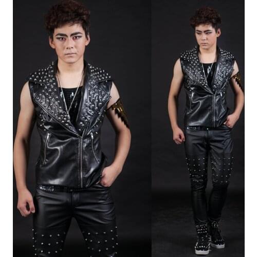 Male singer in bar and nightclub costumes, rivet motorcycle leather vest, leather pants suit, hip-hop European and American men