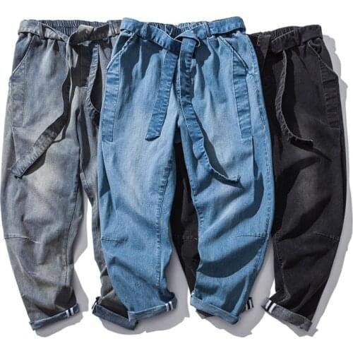 Streetwear Men‘s Jeans Casual Cotton Men Jeans Pants Oversized Drawstring Belt Fashion Woman Denim Trousers Ribbon 5XL