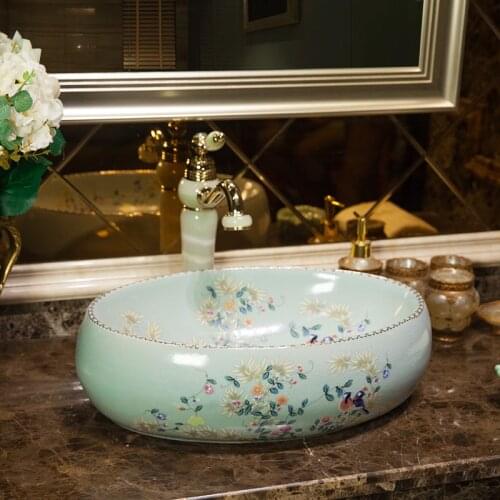 Above counter basin ceramic wash basin washbasin oval small art wash basin bathroom wash basin household