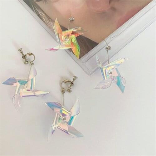 AOMU 2021 Fashion Cool Simple White PVC Laser Windmill Earrings Smooth Irregular Geometric Drop Earrings for Women Gifts Jewelry