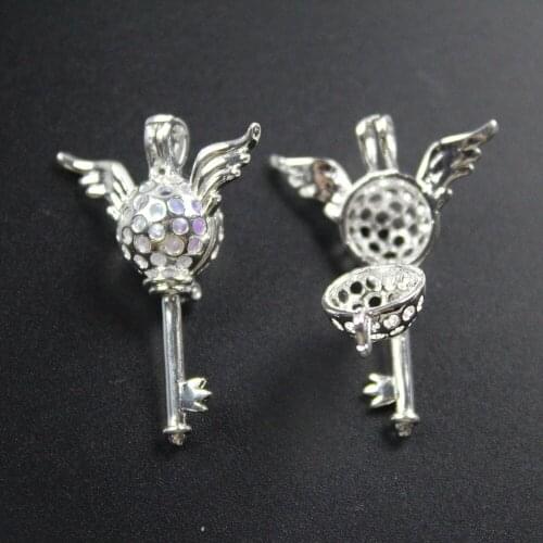 35*26mm，Flying Key Pearl Cage Essential Oil Diffuser Pendant,Aromatherapy Locket Necklace Volcanic Setting Lava Stone Jewelry,HM