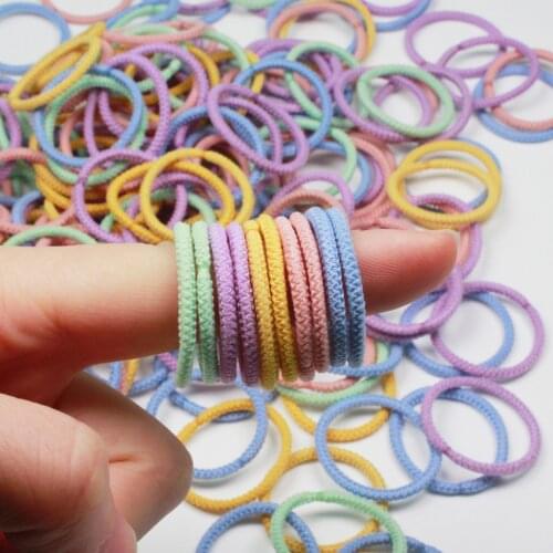 100 pieces Quality Multi-color Girls' Ouchless Hair Ties Candy Color No Crease Tiny Hair Bands Ponytail Holder Zip Bag FQ003