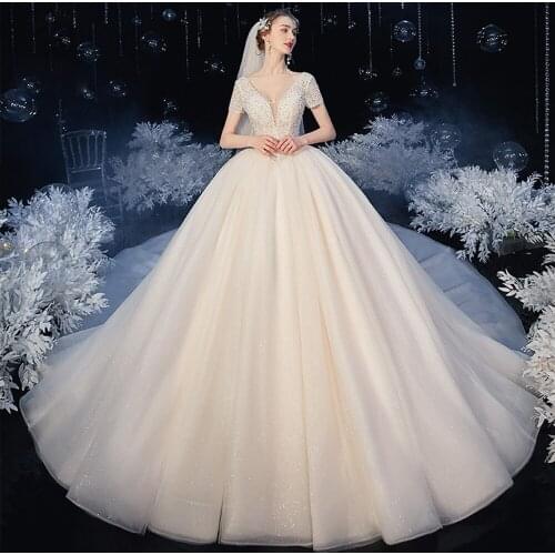 Deep V-neck Lace Up Back Short Sleeve Sparkly Beading Crystal Body Shiny Princess Ball Gown Wedding Dresses With Chapel Train