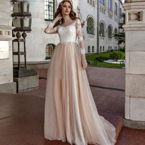 New A-Line White and Champagne Wedding Dress Tulle Appliques Illusion O-Neck See Through Back Bridal Gowns