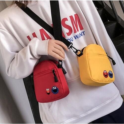 DOLOVE Fashion Handbag Sesame Street Cartoon Shoulder Bag Student Jumping Small Canvas Bag 2020 New Women Nylon Crossbody Bag