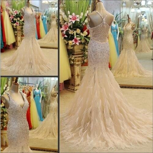 Free shipping 2016 luxury crystal beaded sexy formal bride champagne long married evening gowns with feathers party prom dresses