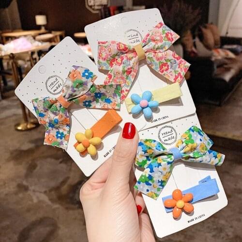 Korean version of the new childrens fabric bowknot floral hairpin small fresh baby girl flower hairpin side clip hair accessori