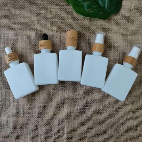 1oz amber square glass dropper bottle Eco-friendly bamboo cap Cosmetic essential oil aromatherapy Container packaging facial oil