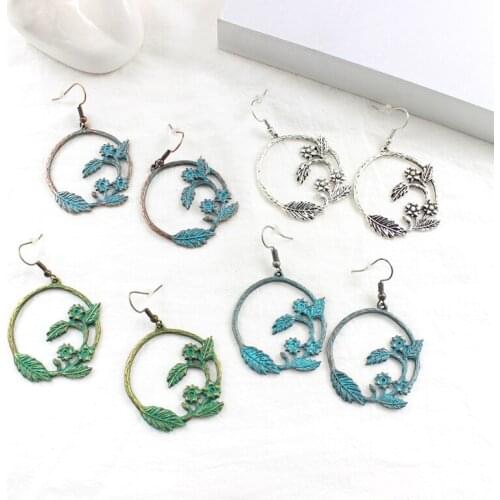 Vine surrounded by large round cutout carved leaf earrings personality Retro Creative Glamour ladies jewelry National wind