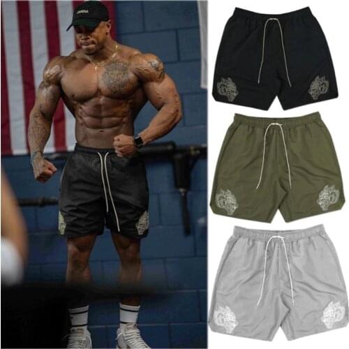 Summer Gyms Workout Male Loose Breathable Quick Dry Sportswear Jogger Beach Solid Shorts Men Fitness Bodybuilding Shorts