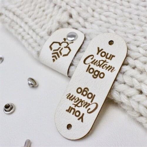 Faux leather labels for handmade, knitted and crocheted items with custom logo vanilla color engraved on one or two sides with r