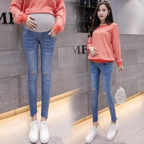 1170# Maternity Clothes Spring Autumn Hole Decoration Stretch Maternity Jeans Elastic Waist Maternity Trousers