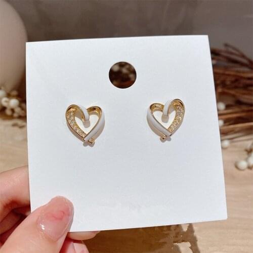 Korean metal material geometric shape drop oil white heart-shaped stud earrings small fresh earrings