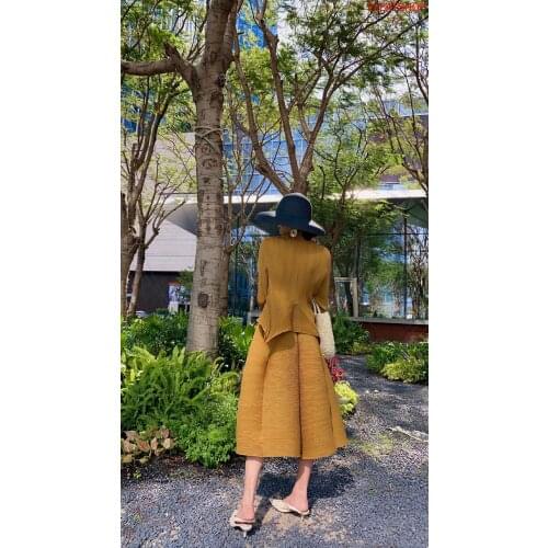 European and American Autumn New Casual Simple Solid Color Ruffled Long-sleeved T-shirt + High Waist Skirt Suit Women Skirts Set