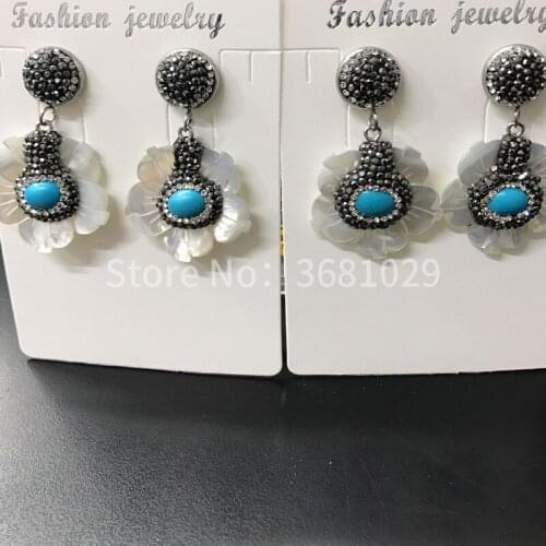 Beautiful Daisy shell earrings with elegant and long style European and American female earrings