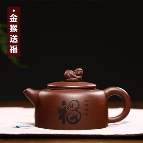 Authentic yixing ores are recommended by the pure manual purple clay gift household teapot tea set golden monkey