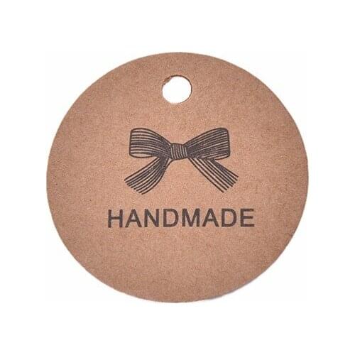 100pcs/lot Brown Garment labels Handmade Bowknot Kraft Label Vintage Label DIY Hand Made For Gift Cake Baking Sealing Hang tag