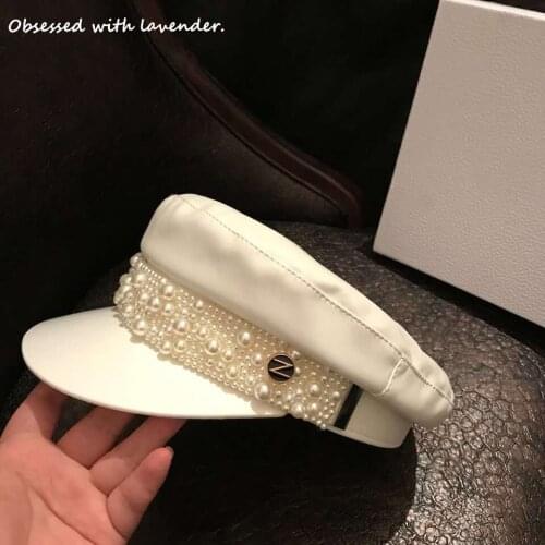 Obsessed with lavender. Stars with white Pearl Hat Navy berets berets women pu leather England retro octagonal hat