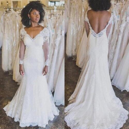 2020 Illsion Long Sleeve Wedding Dresses Lace Applique Backless African Mermaid Sweep Train Sexy V Neck Bride Gowns