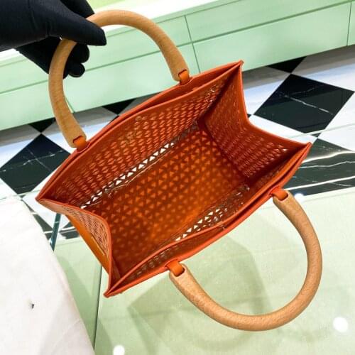 2021 new hollow flower large-capacity womens handbag clothing all-match leather