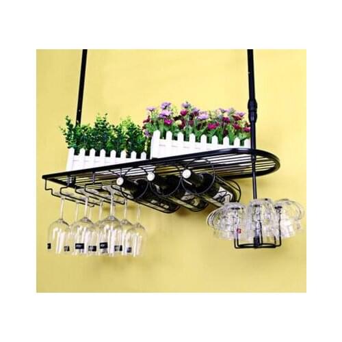 Hanging glass frame. The bar wine rack