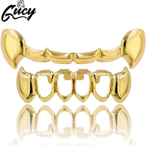 GUCY Hip Hop Teeth Grills Gold Color Plated Half Fang Slim Top Hollow Fang Lower Bottom Vampire Teeth Grillz Set Gift Party