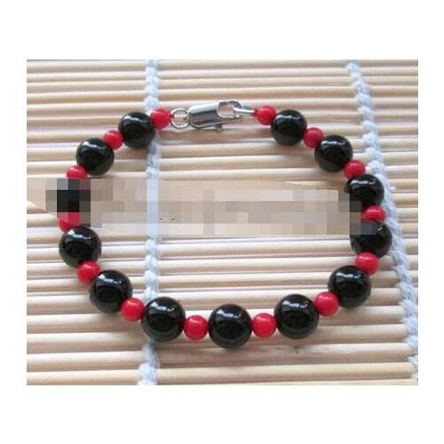 Natural round black onyx + coral bracelet