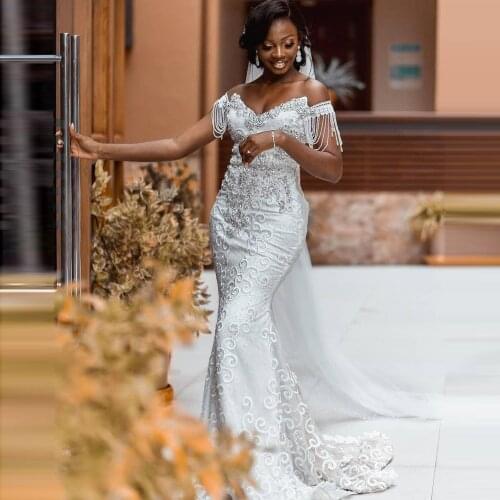 Luxury Beaded Mermaid Wedding Dresses Off Shoulder Crystal Tassels Lace Appliqued Nigerian Arabic Robe De Mariee Bridal Gowns