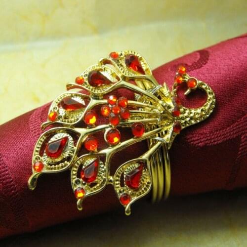 Metal christmas bird with crystal napkin rings