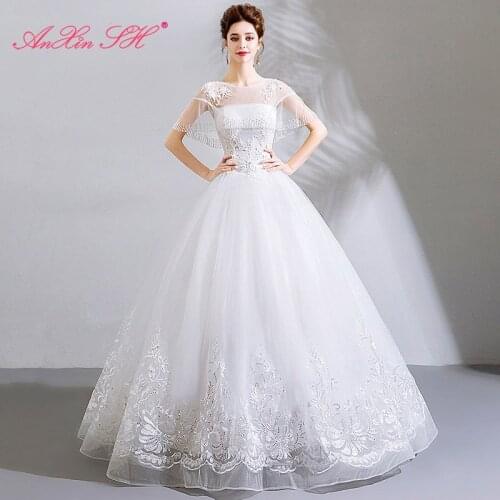 AXJFU princess Fairy gas lotus leaf goddess fan covered flesh lace wedding dress flowers princess bride wedding dress 9056