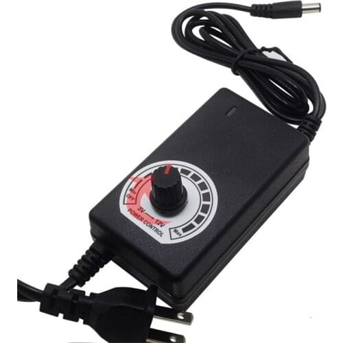 100 PCS Universal power adapter Adjustable AC 100V-240V to DC 3V-12V Multiple protection features Regulated supply adatpor 2A