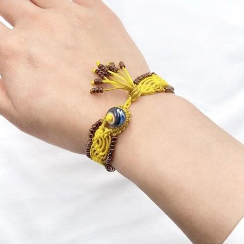 2021 Chinese style handmade oblique winding knot womens ethnic retro beaded rice bead ceramic girl bracelet popular accessories