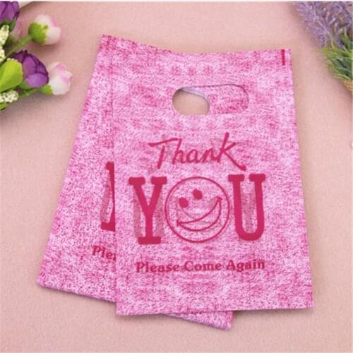 2017 New Design Wholesale 100pcs/lot 13*18cm Thank You Shopping Plastic Bags Favor Lipstic Packaging Bags With Smile Face