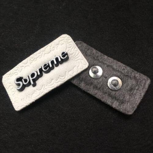 Genuine Leather Label 1.7x3cm Customize Design Process Garment Tag For Jeans