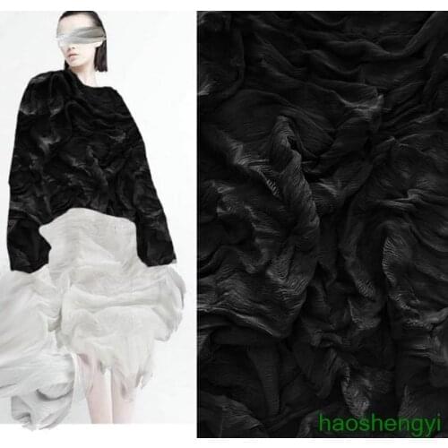High quality black cross horizontal hills stacked sea grass pleated texture micro-transparent fashion fabric / half price