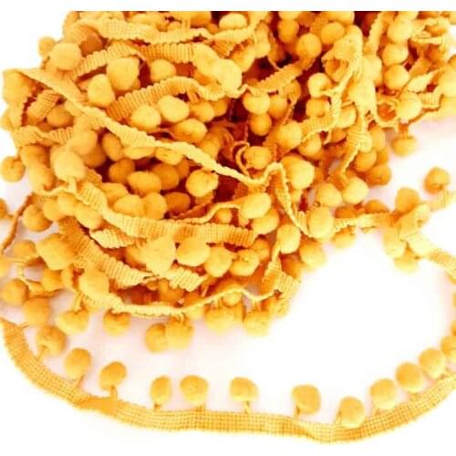 Mustard yellow color pompom ribbon ornament
